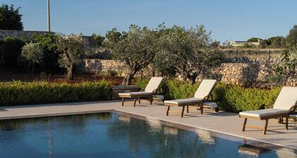 Cici and Michela estate surrounded by greenery with private pool