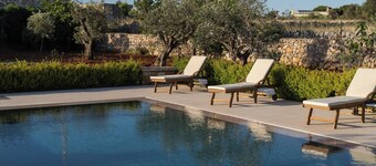 Cici and Michela estate surrounded by greenery with private pool