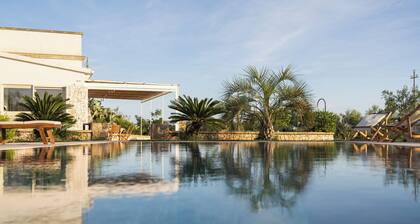 Cici and Michela estate surrounded by greenery with private pool