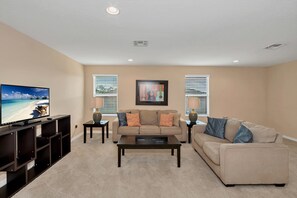 Villa (1042TOUR) | Living room | Flat-screen TV, books