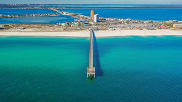 On the beach, sun loungers, beach towels