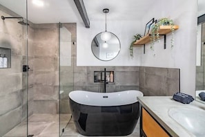 Bathtub, hair dryer, towels