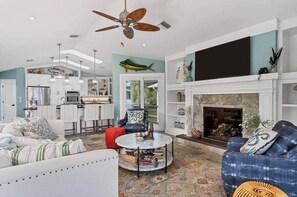 Smart TV, fireplace, books