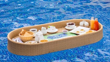 Tuskers Pool Villa | Iron/ironing board, bed sheets