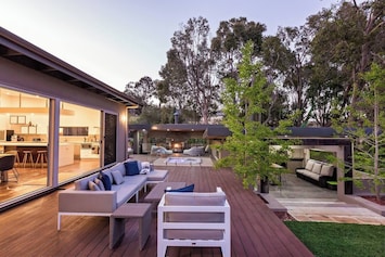 The ultimate entertaining space—the outdoor deck offers ample seating and relaxation options.