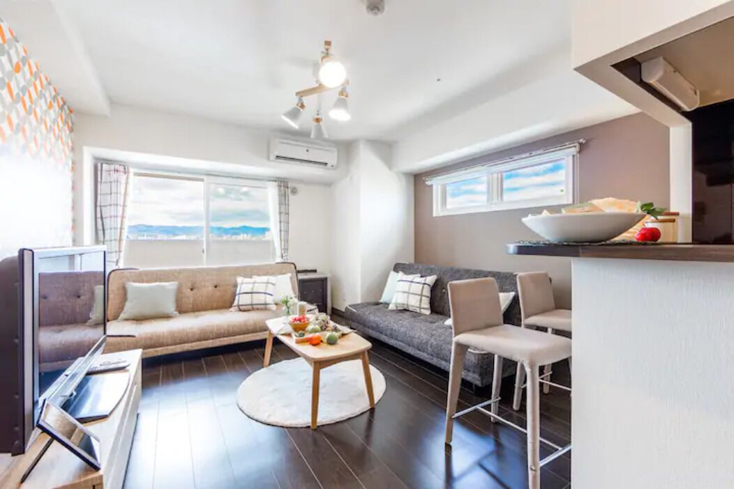 Apartment, Non Smoking | Living area | Flat-screen TV