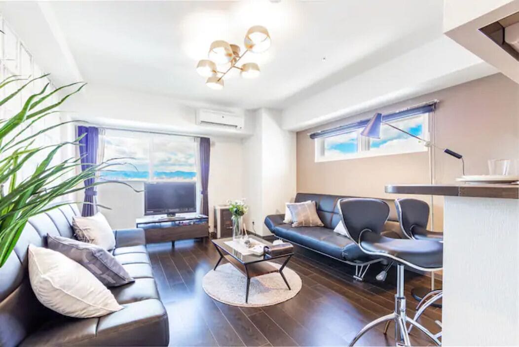 Apartment, Non Smoking | Living area | Flat-screen TV