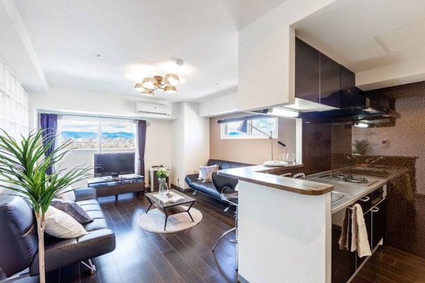 Apartment, Non Smoking | Living area | Flat-screen TV