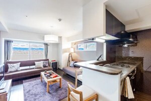 Apartment, Non Smoking | Living area | Flat-screen TV