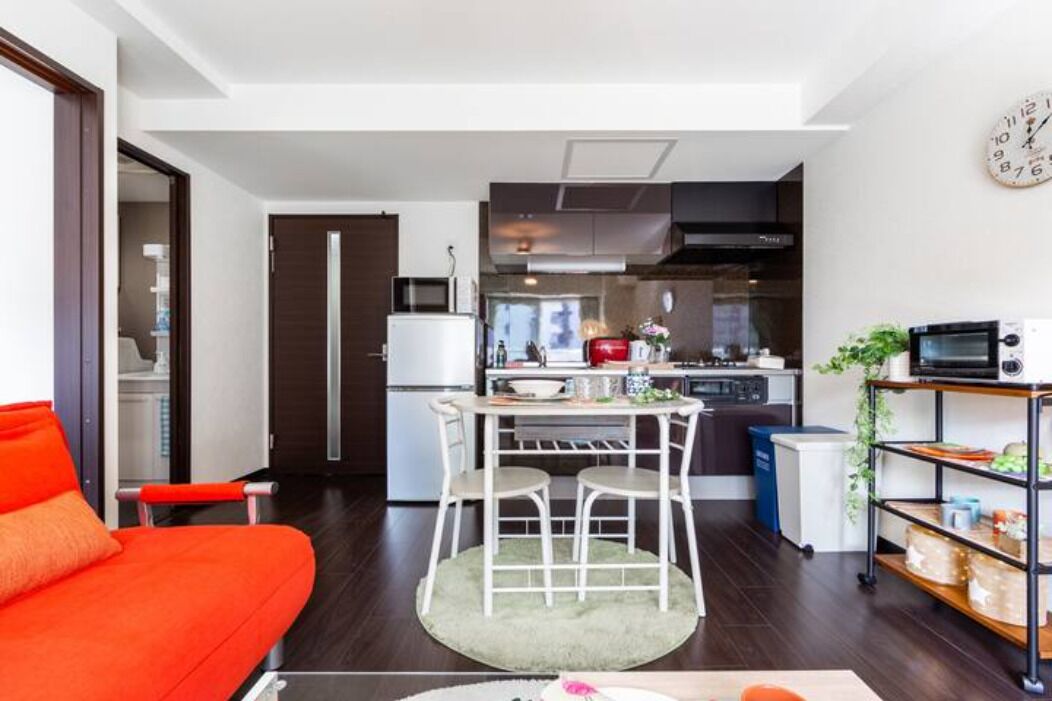 Apartment, Non Smoking | Living area | Flat-screen TV