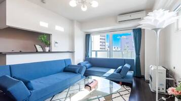 Apartment, Non Smoking | Living area | Flat-screen TV