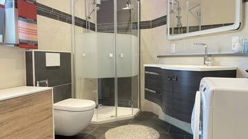 Shower, jetted tub, towels, soap