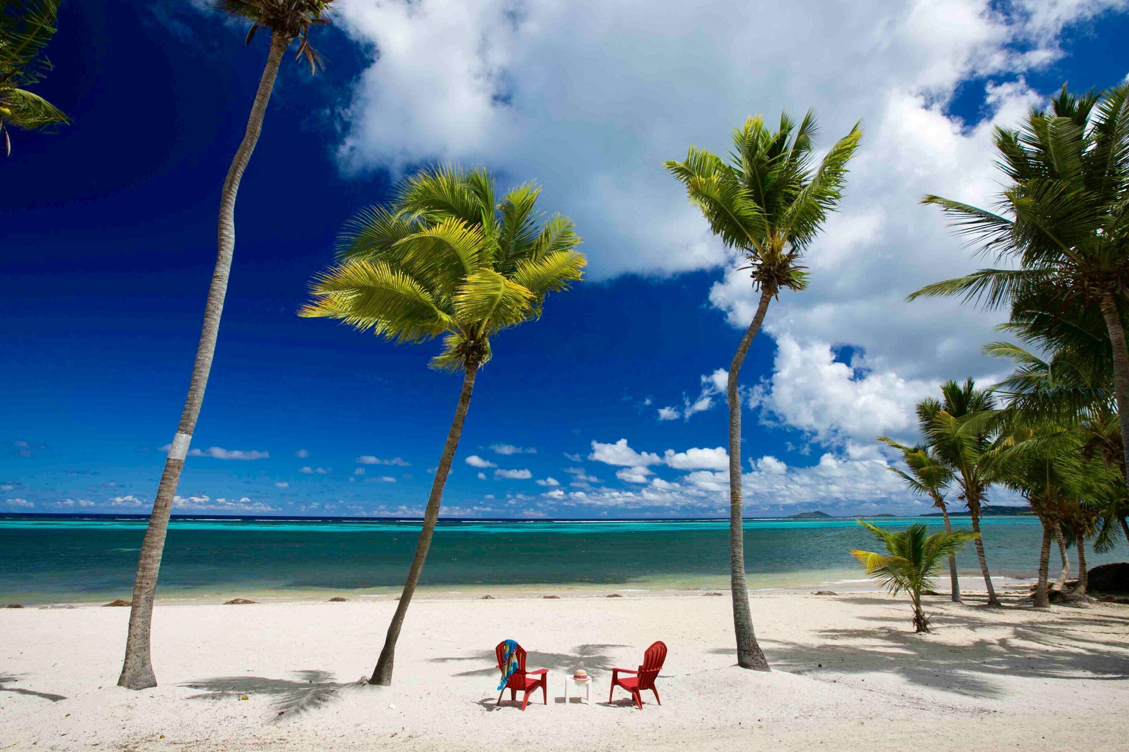 On the beach, sun loungers, beach towels