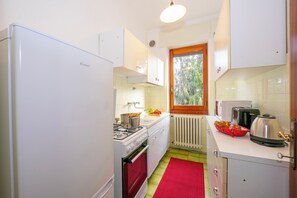 Family Villa, Multiple Bedrooms, 2 Bathrooms, Mountainside (Villa La Verbanina Private Garden) | Private kitchen | Fridge, microwave, oven, stovetop