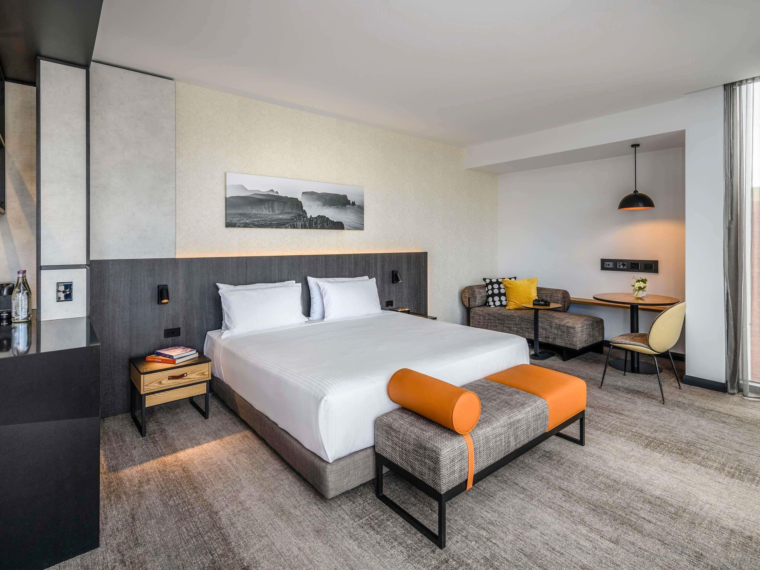 Suite, City View | Premium bedding, minibar, in-room safe, individually decorated
