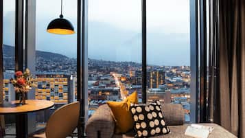 Suite, City View | Premium bedding, minibar, in-room safe, individually decorated