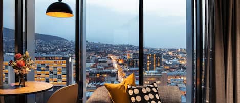 Suite, City View | Premium bedding, minibar, in-room safe, individually decorated