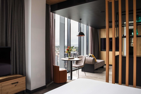 Suite, City View | Premium bedding, minibar, in-room safe, individually decorated