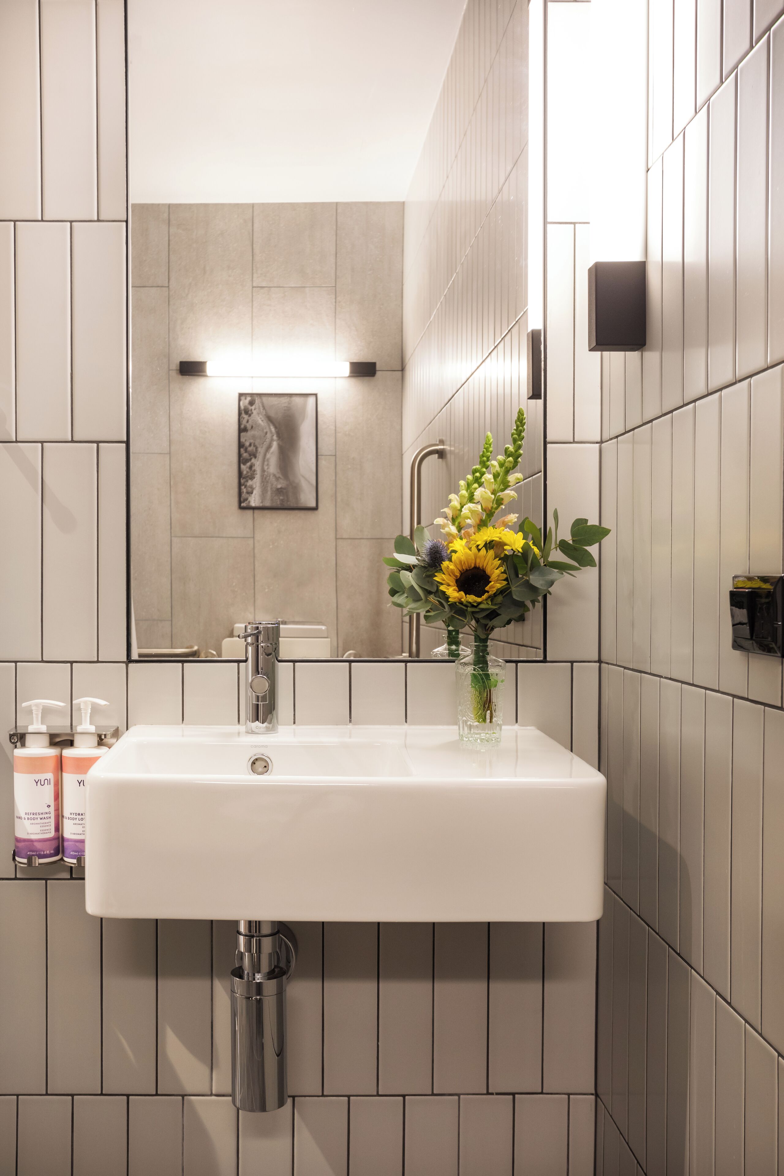 eco-friendly toiletries, hair dryer, towels, soap