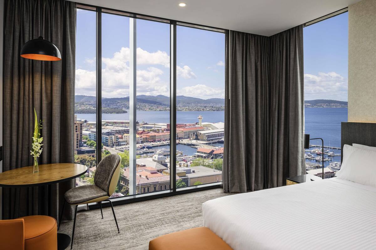 deluxe room, 2 queen beds, harbour view | 1 bedroom, premium bedding, minibar, in-room safe