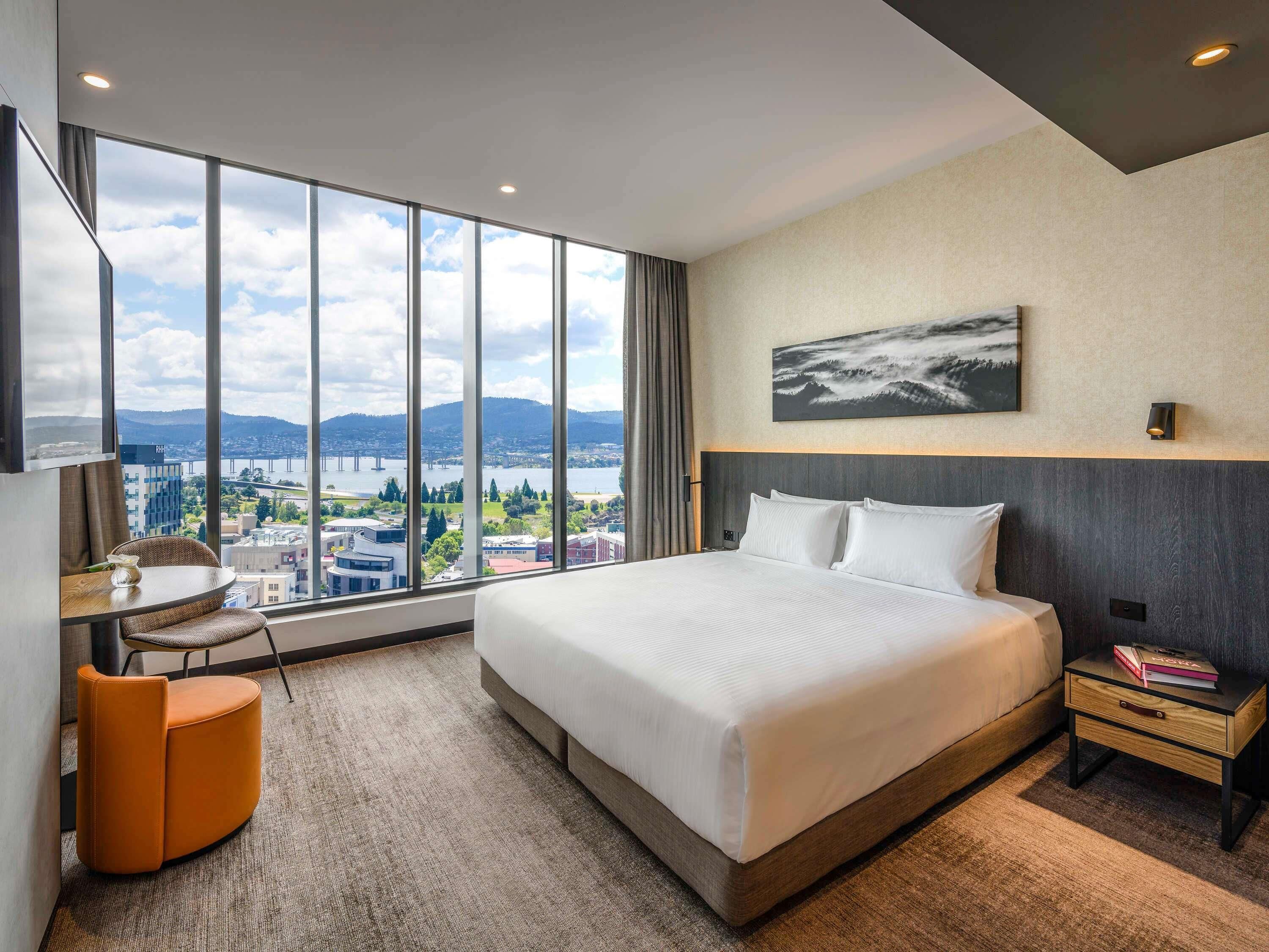 Deluxe Room, 1 King Bed, Harbor View | Premium bedding, minibar, in-room safe, individually decorated