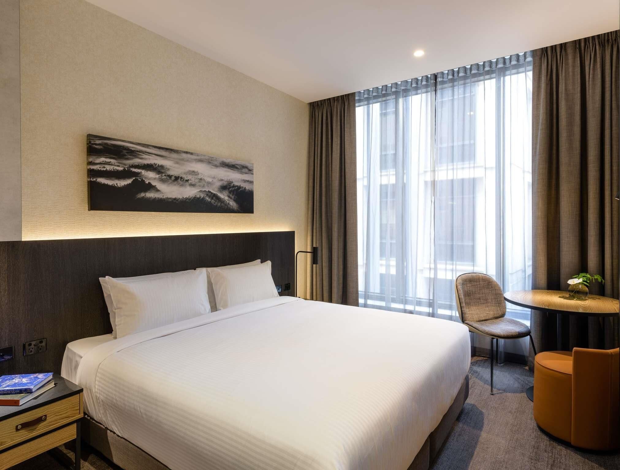 Habitación clásica, 1 cama King size | Ropa de cama de alta calidad y minibar 