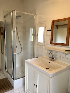 Shower, hair dryer, towels, soap