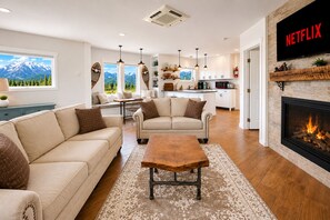 Flat-screen TV, fireplace, DVD player