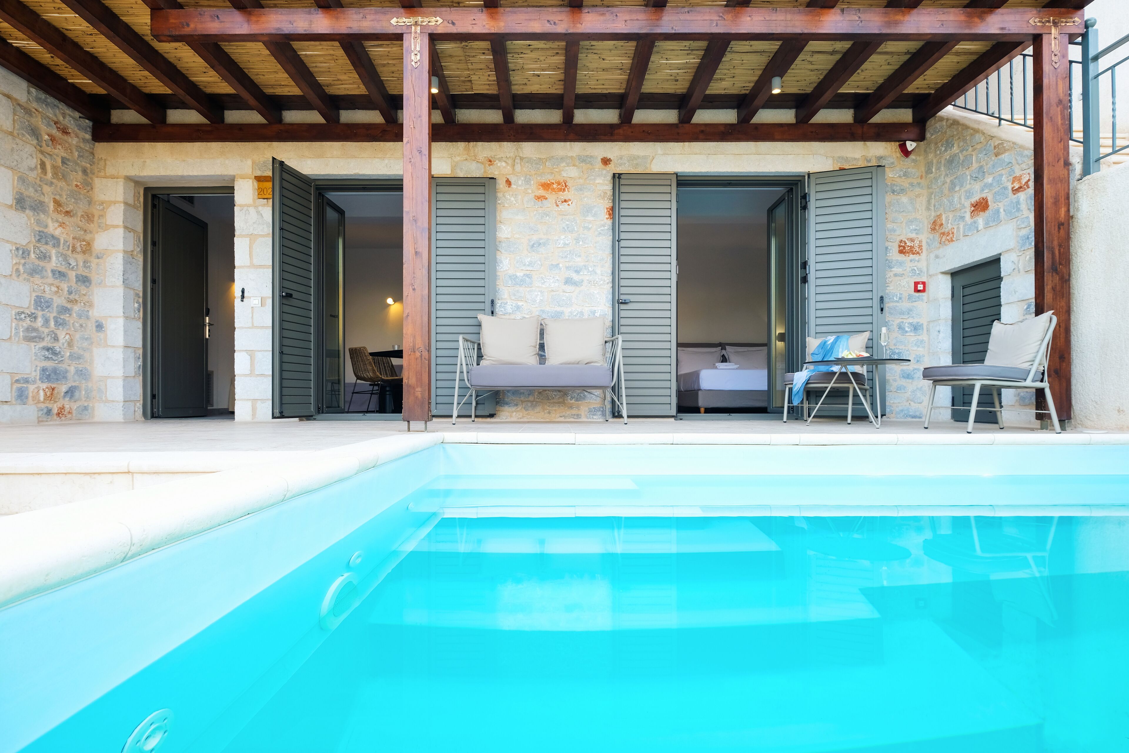 Suite Exécutive, piscine privée | Literie de qualité supérieure, minibar, coffres-forts dans les chambres