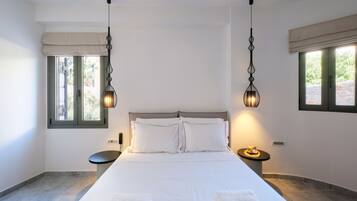 Suite Supérieure, vue jardin | Literie de qualité supérieure, minibar, coffres-forts dans les chambres