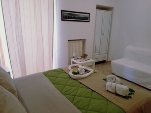1 dormitorio, cuna de viaje, wifi gratis y ropa de cama