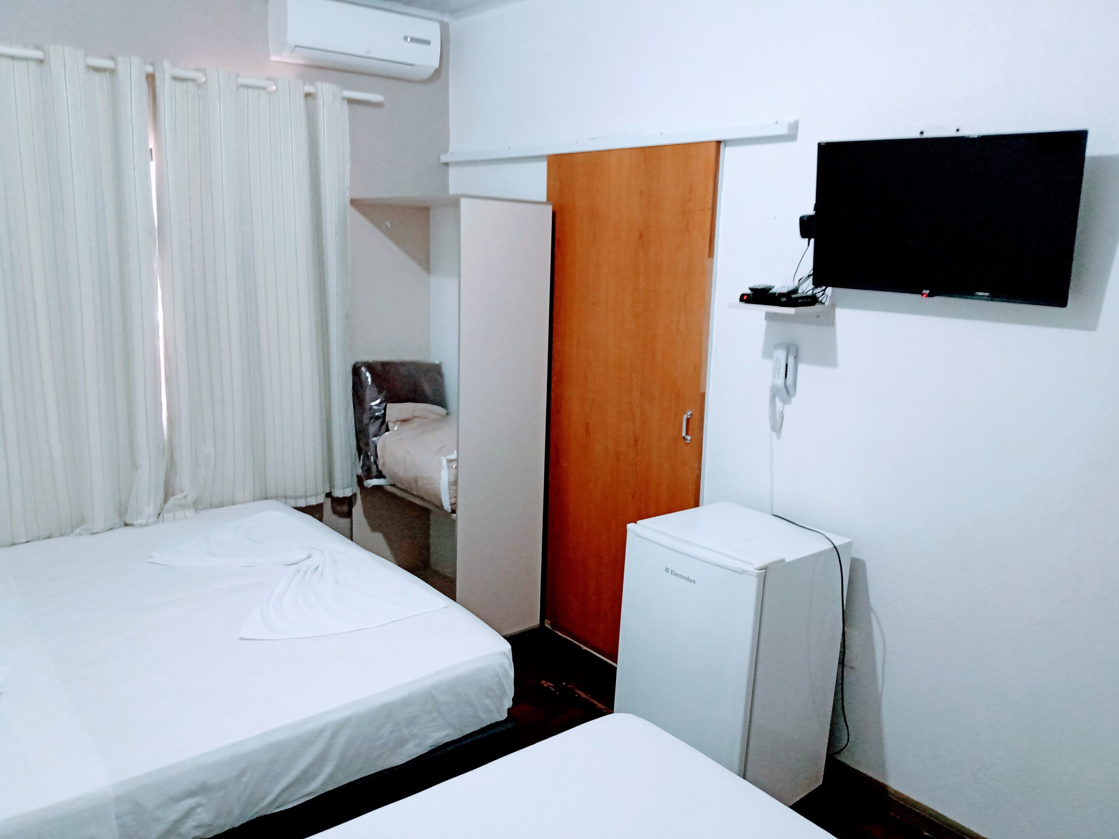 Desk, laptop workspace, free WiFi, bed sheets