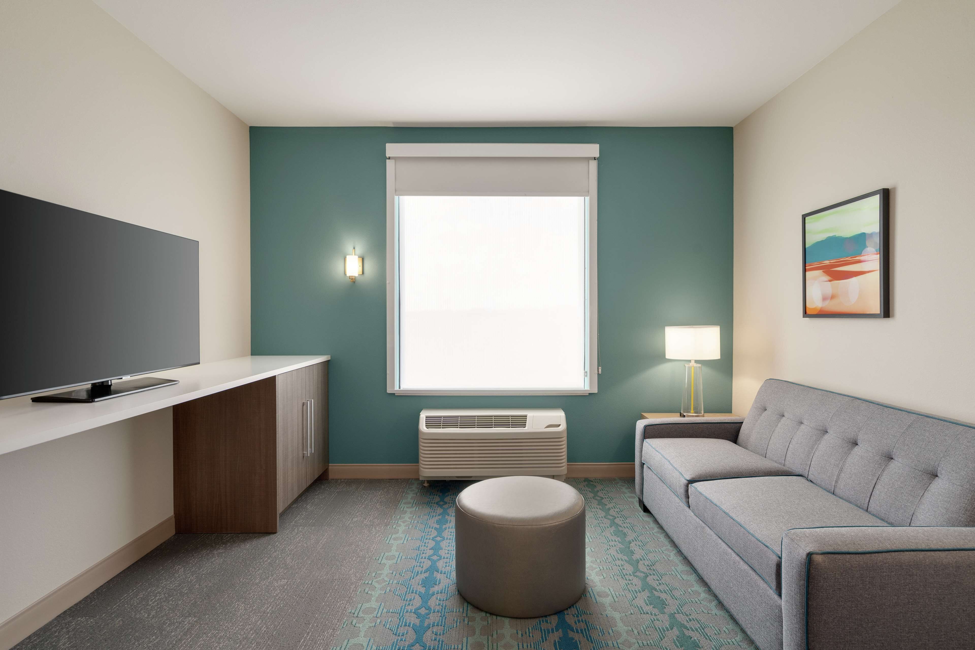 desk, laptop workspace, blackout curtains, iron/ironing board