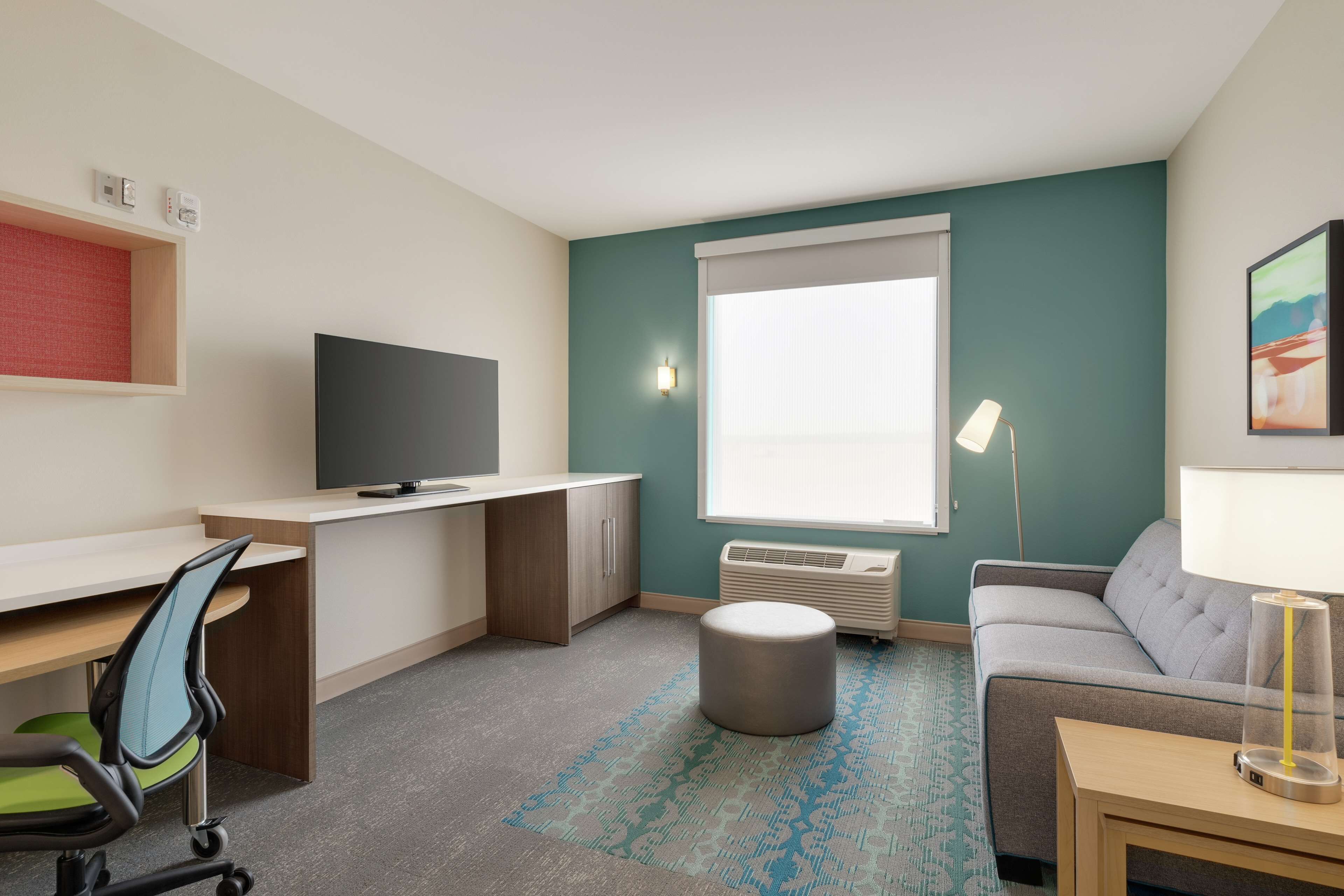 desk, laptop workspace, blackout curtains, iron/ironing board