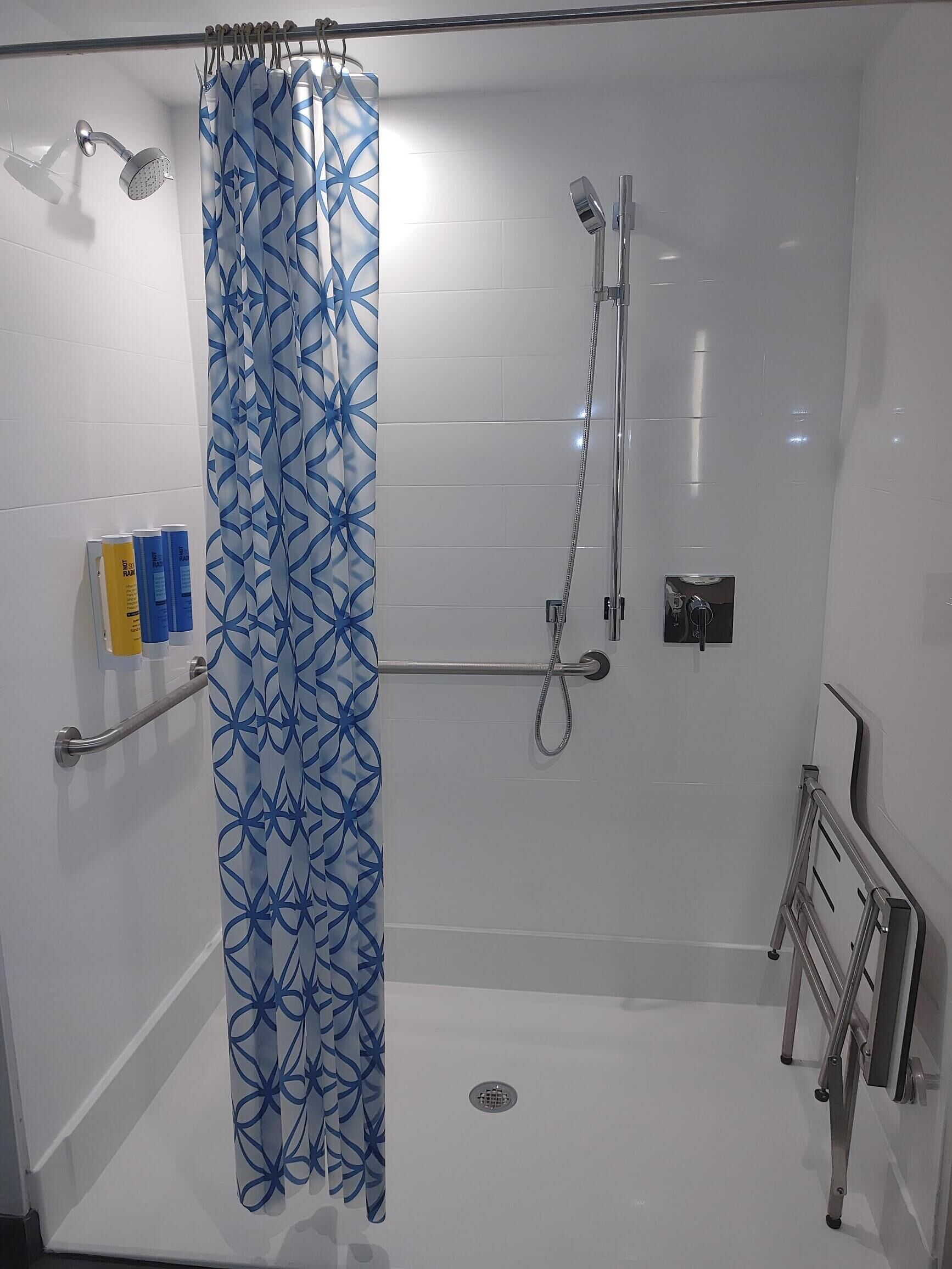 room, 1 king bed, accessible (roll-in shower) | bathroom | shower, rainfall showerhead, towels