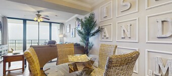 Bright & beachy waterfront condo with pools, tennis, gym, spacious balcony & W/D