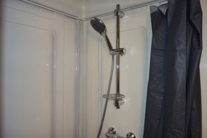 Shower, towels, toilet paper