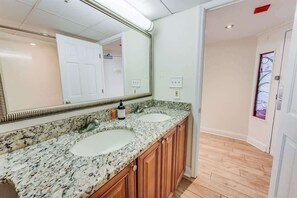 Combined shower/bathtub, hair dryer