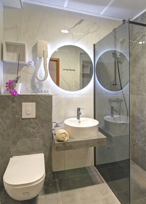 Hair dryer, towels, soap, shampoo