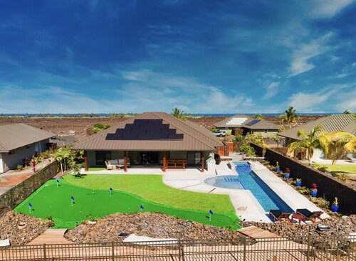 Ultimate Luxury Resort Vacation- Island Oasis Villa has a lap pool and minature golf course