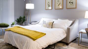 1 bedroom, memory foam beds, desk, travel crib