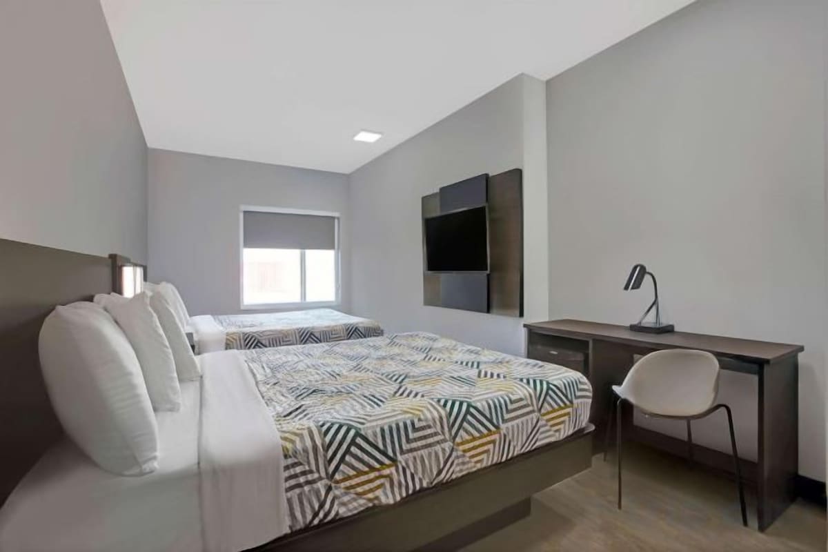 Desk, laptop workspace, free WiFi, bed sheets