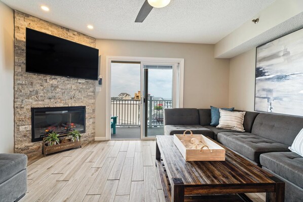 TV, fireplace, books, offices