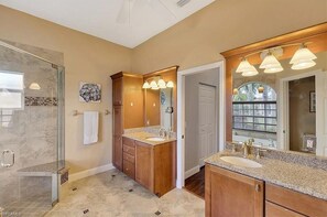 Combined shower/tub, hair dryer, towels, soap - Spacious private pool home, close to beaches, with many upgrades! (Fort Myers)