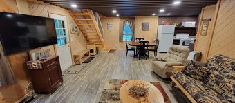 COZY CABIN NEAR A CREEK IN THE FOREST