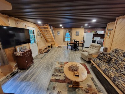 COZY CABIN NEAR A CREEK IN THE FOREST