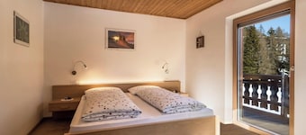 Appartamento "Kesselberg" vicino all'area sciistica con vista sulla foresta e giardino in comune