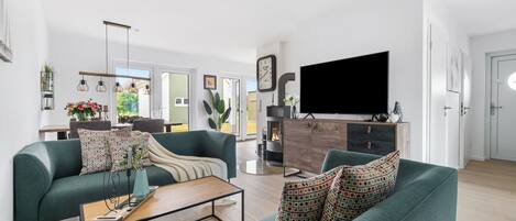 Télévision, cheminée, vidéothèque