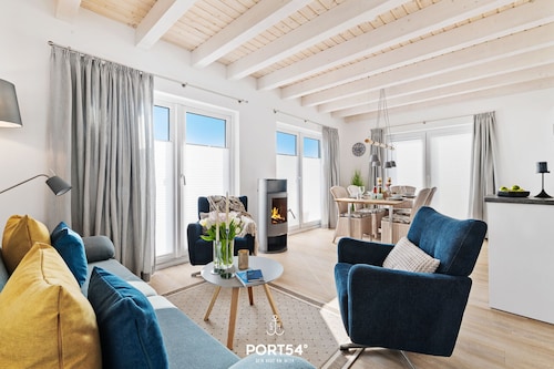 Blaue Blume Vacation Home in a North Sea seaside resort—near the beach, with a sauna and a terrace, modern