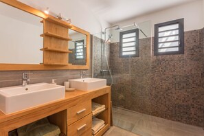 Shower, hair dryer, towels, soap